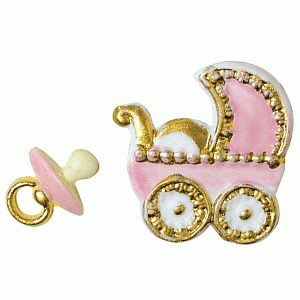 Geboorte figuren roze voor op een kaars